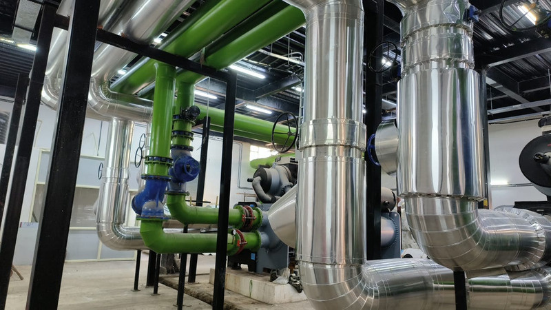 Chilled-water plant room with insulated headers
